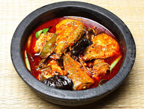 Coastal Karnataka fish curry in a clay bowl
